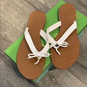 NWOT Kate Spade “Charles” flip flops (white brown)